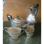 A plated four piece tea/coffee set.