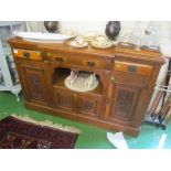 An oak sideboard with breakfront.