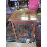 An Edwardian square top table