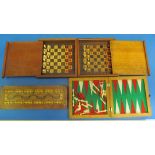 A Cribbage board box and three travelling chess sets