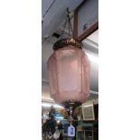 A pink glass hexagonal shape ceiling light