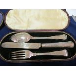 A Victorian engraved three piece set of knife, fork and spoon