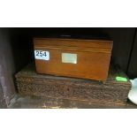 A mahogany box with mother of pearl inlaid lid and an Indian box