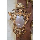 A small gilt mirror