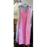 A Frank Usher 1960's pink linen dress with applied pink and white flowers to neckline.