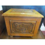 A small oak chest carved with galleon to lid
