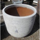 A large pottery plant pot