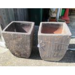 A pair of large pottery plant pots