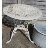 A white metal garden table