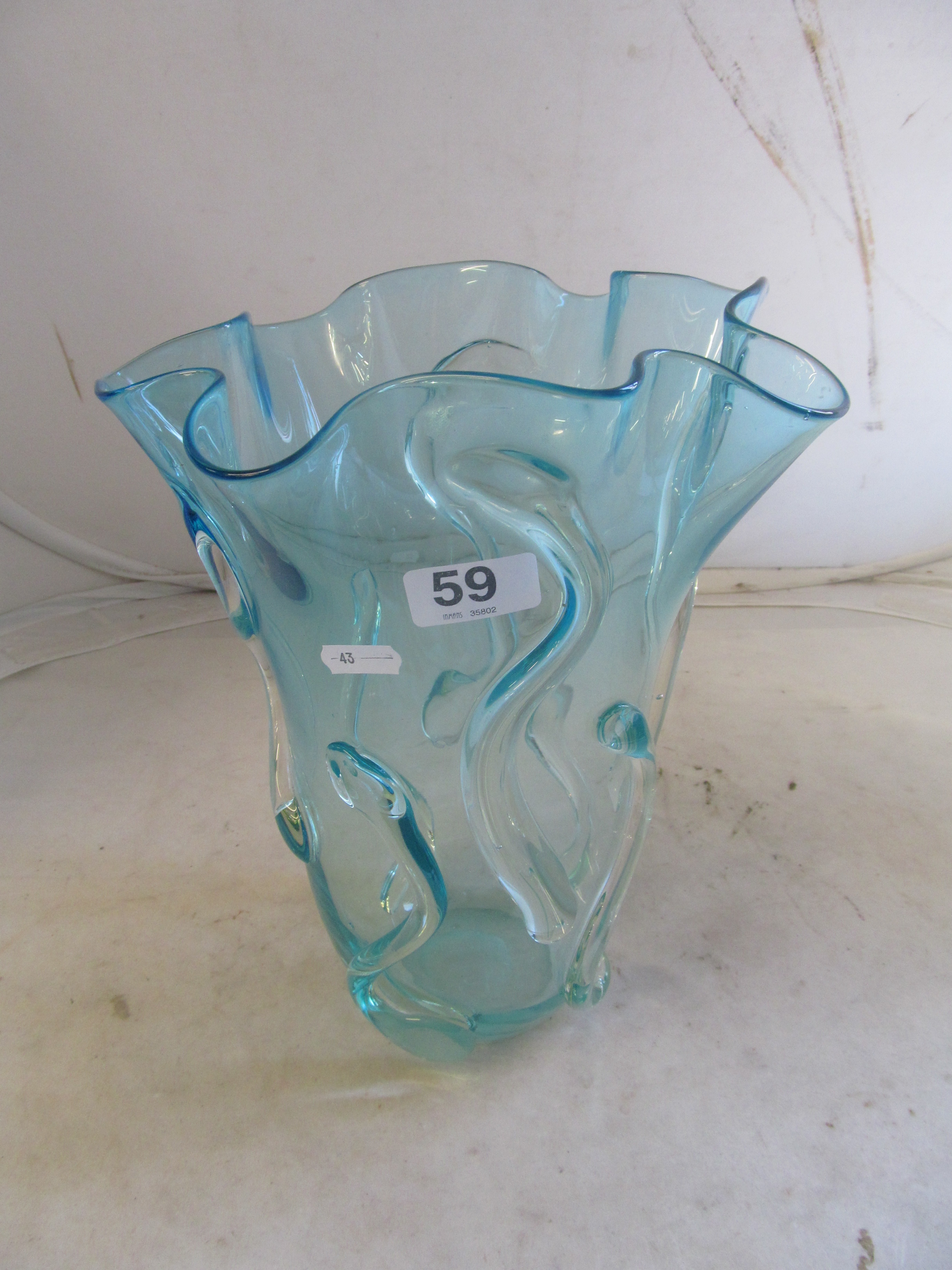 A frilled edge blue Art Glass vase