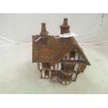 A pottery cottage, marked Suffolk