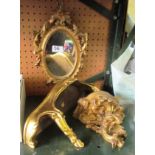 Two gilt wall brackets and a small gilt framed mirror