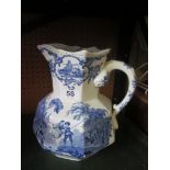 A large Masons blue and white jug girl on a swing