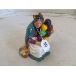 A Royal Doulton figure The Old Balloon seller HN1315