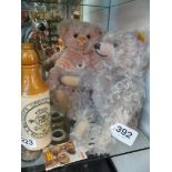 A Steiff pink bear and grey bear