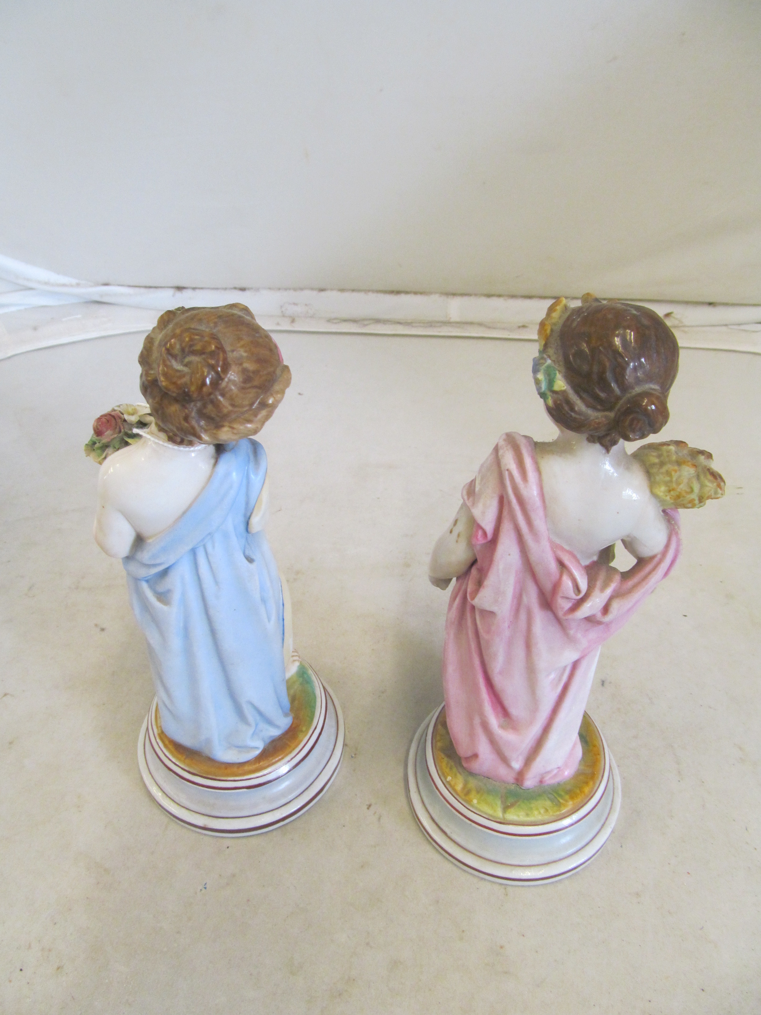 A pair of porcelain figures cherubs spring and autumn (1 a/f) on circular bases and a Coalport plate - Image 2 of 5