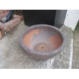 A low circular garden pot