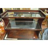 A set of Victorian mahogany and glass display shelves