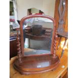 A mahogany swing mirror