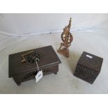 Two early 20th Century carved treen boxes and a miniature spinning wheel