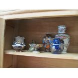 A blue and white vase, oriental style china and two jugs