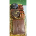 A cased travelling set, collar box, leather cased brush set, camera, tape measure and metal box