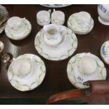 An Edwardian teaset green garland and bow pattern