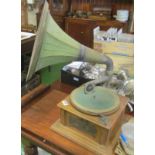 A gramophone with horn and records