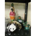 A Beswick panda, parrot, cat, bird and two chicks