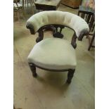An upholstered bow back chair