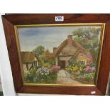 A Victorian embroidery cottage scene in 19th Century rosewood frame