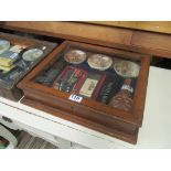 Two table top vitrine cabinets.