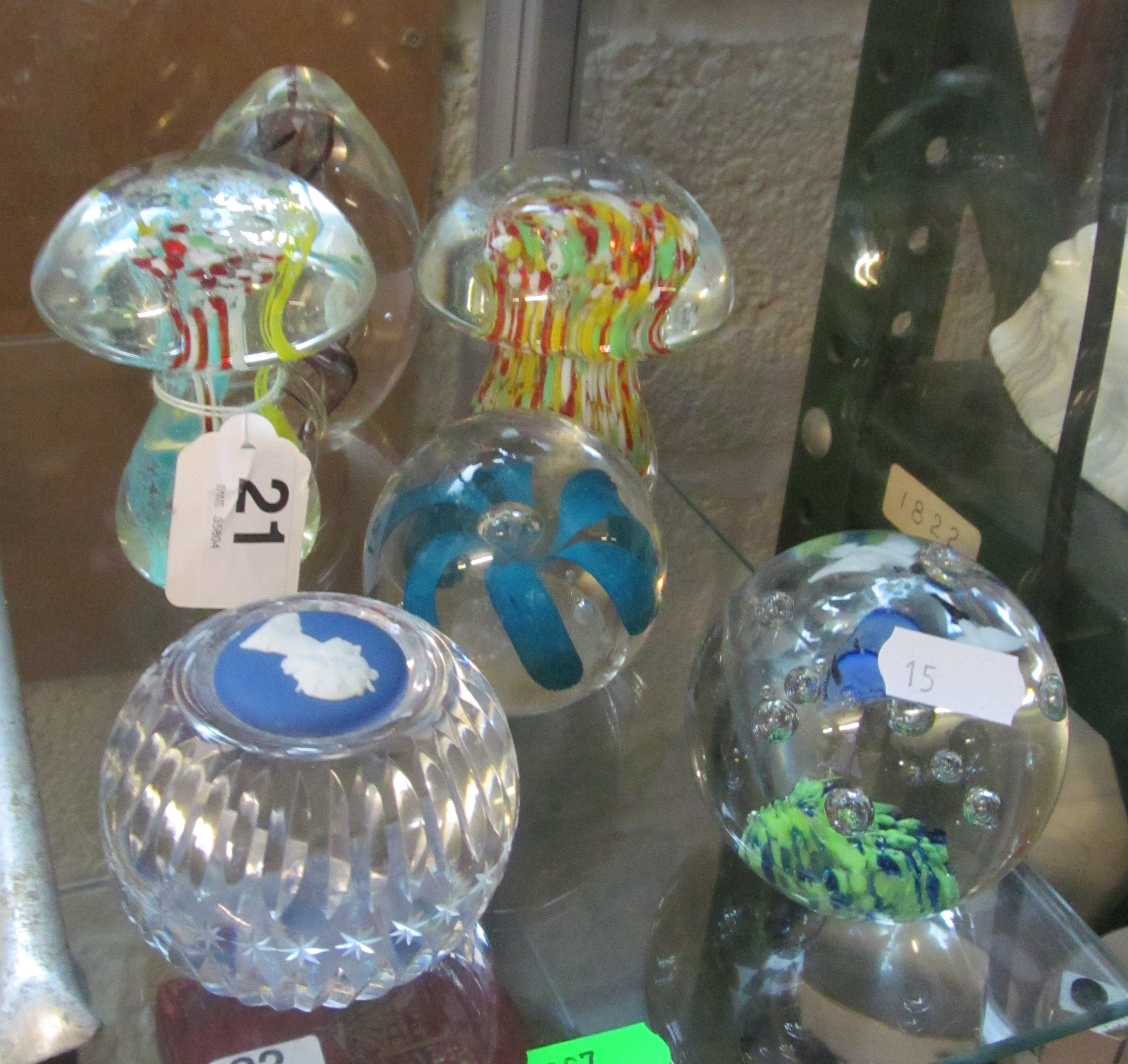 Six paperweights