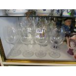 Eight Riedel crystal goblets and four other glasses