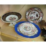 Three oriental design plates, blue and gilt platter and a comport