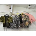 A 1950's short evening jacket, black lace short jacket, peach crop jacket and two other jackets