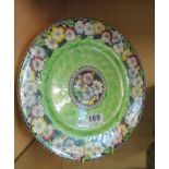 A Maling green and floral plate