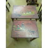 A nest of two painted tea tables