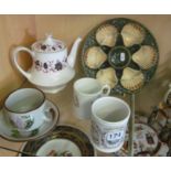 A pottery oyster plate (slightly a/f), teapot, cup, saucer and two mugs