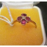 A 9ct gold ring set pink stones