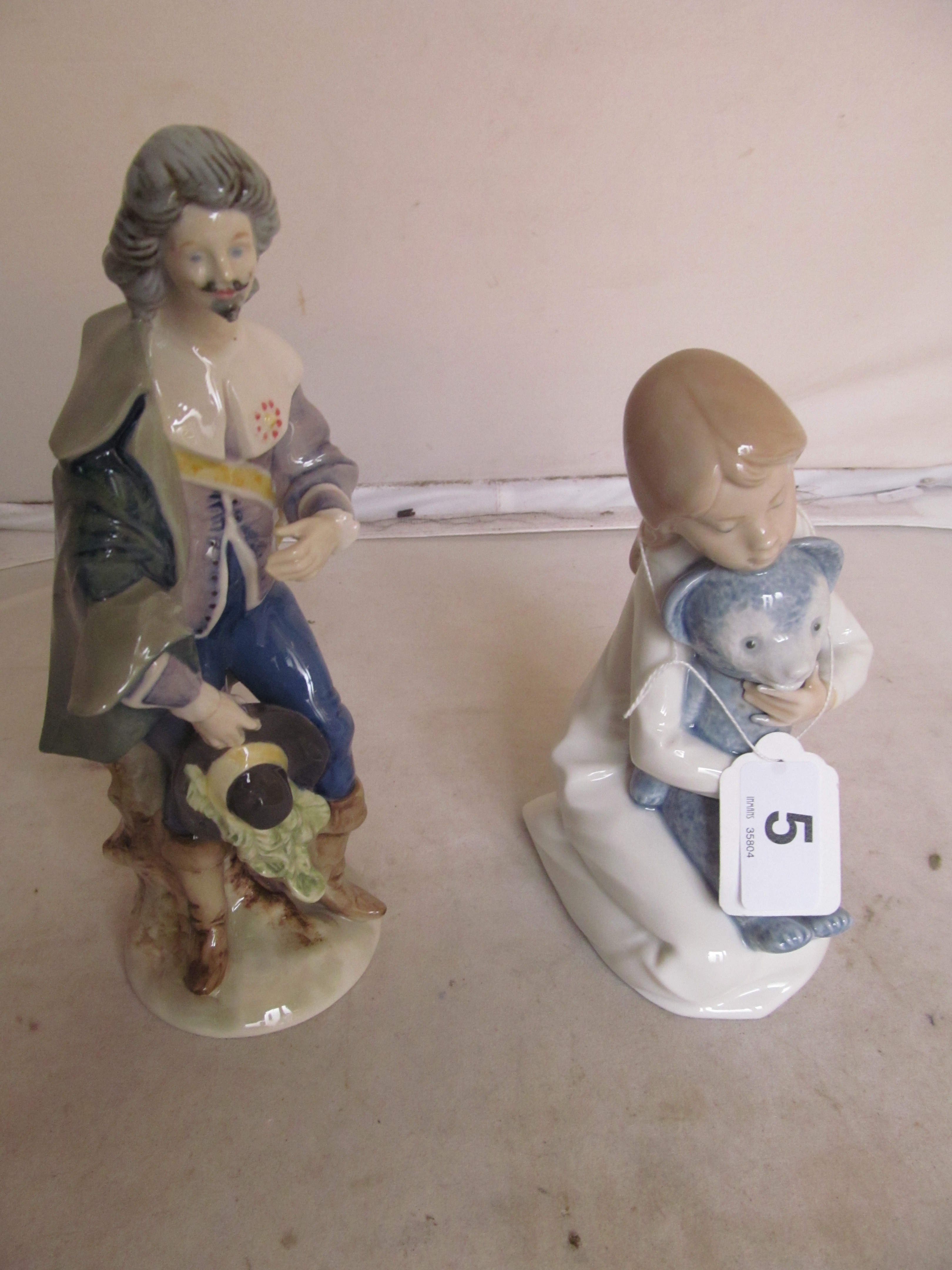 Two Coalport figures and two others