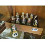 Eleven Burslem miniature character jugs