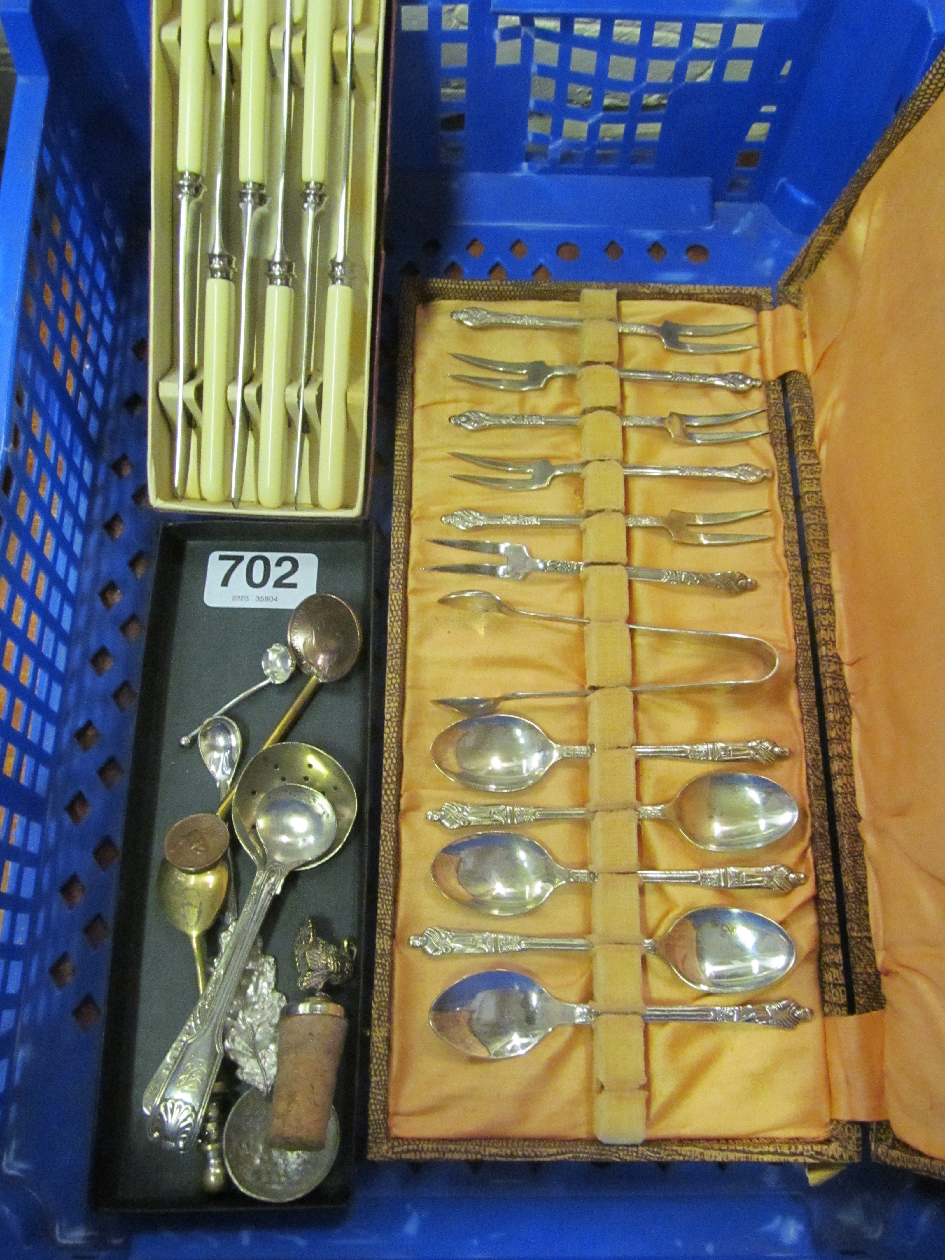 Five spoons, bottle stopper, knives and twelve spoons and tongs (i.c)