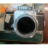 An Exakta camera and a Mamiya camera.