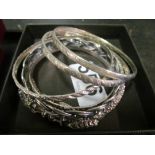 Six silver bangles/bracelets