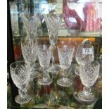 Two Waterford millennium champagne flutes and other Waterford glasses