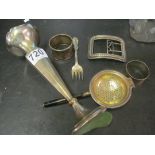 A silver spill vase, 2 napkin rings, strainer, buckle and fork