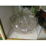A glass punch bowl and glasses