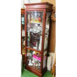 A narrow display cabinet