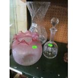 A tall glass vase, pink frilled edge shade and a decanter